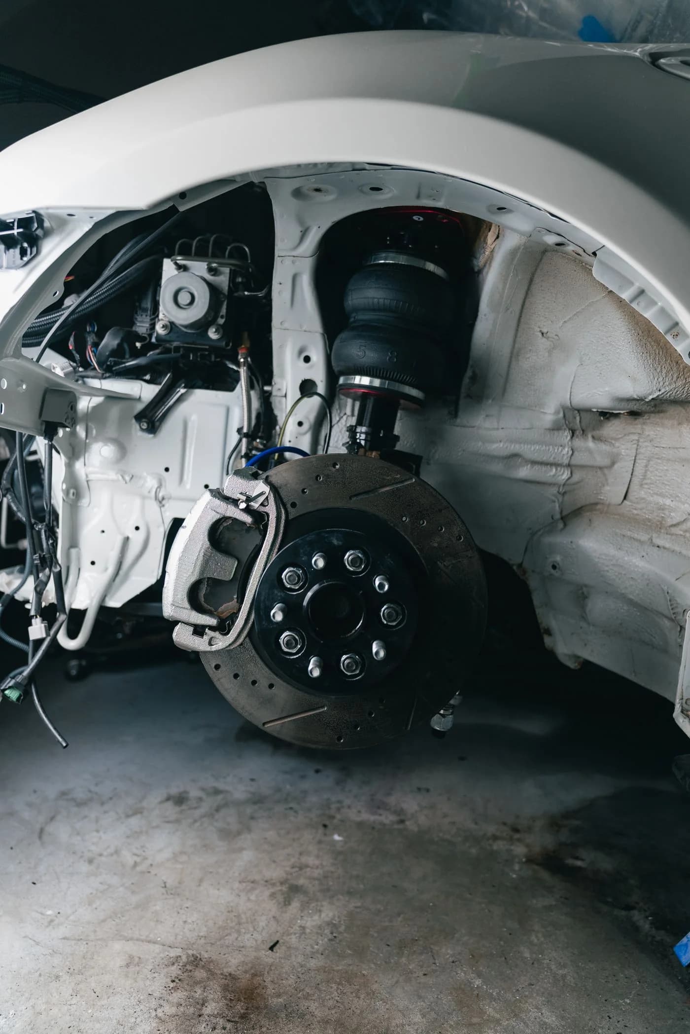 Suspension hardware — Components that connect the wheel assembly and vehicle body.